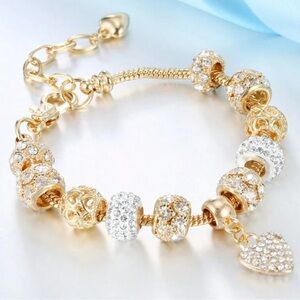 Elegant Gold and Rhinestone Charm Bracelet